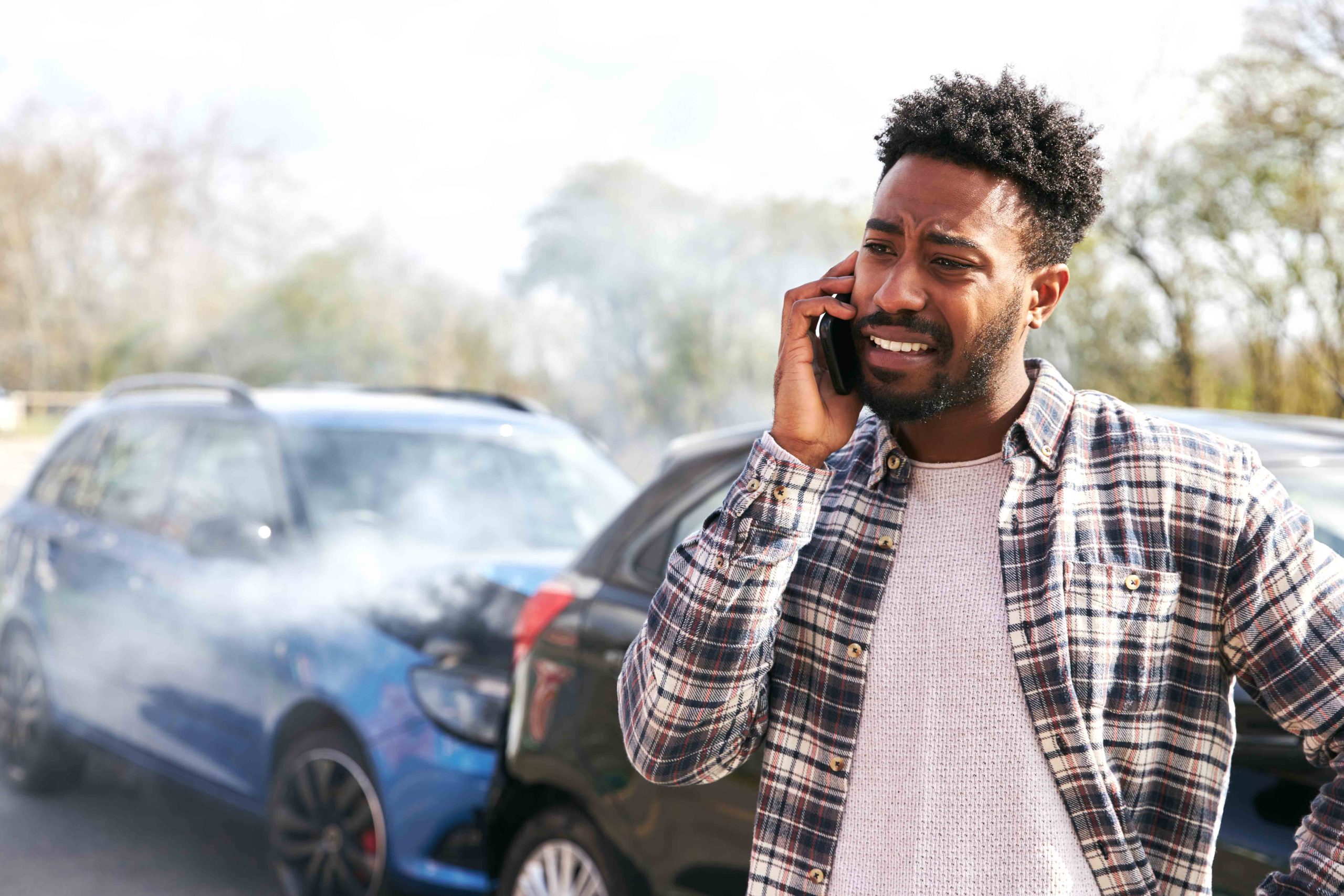 A person making a phone call to their insurance company.