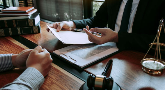 Attorney discussing legal options with a client after a construction site accident.