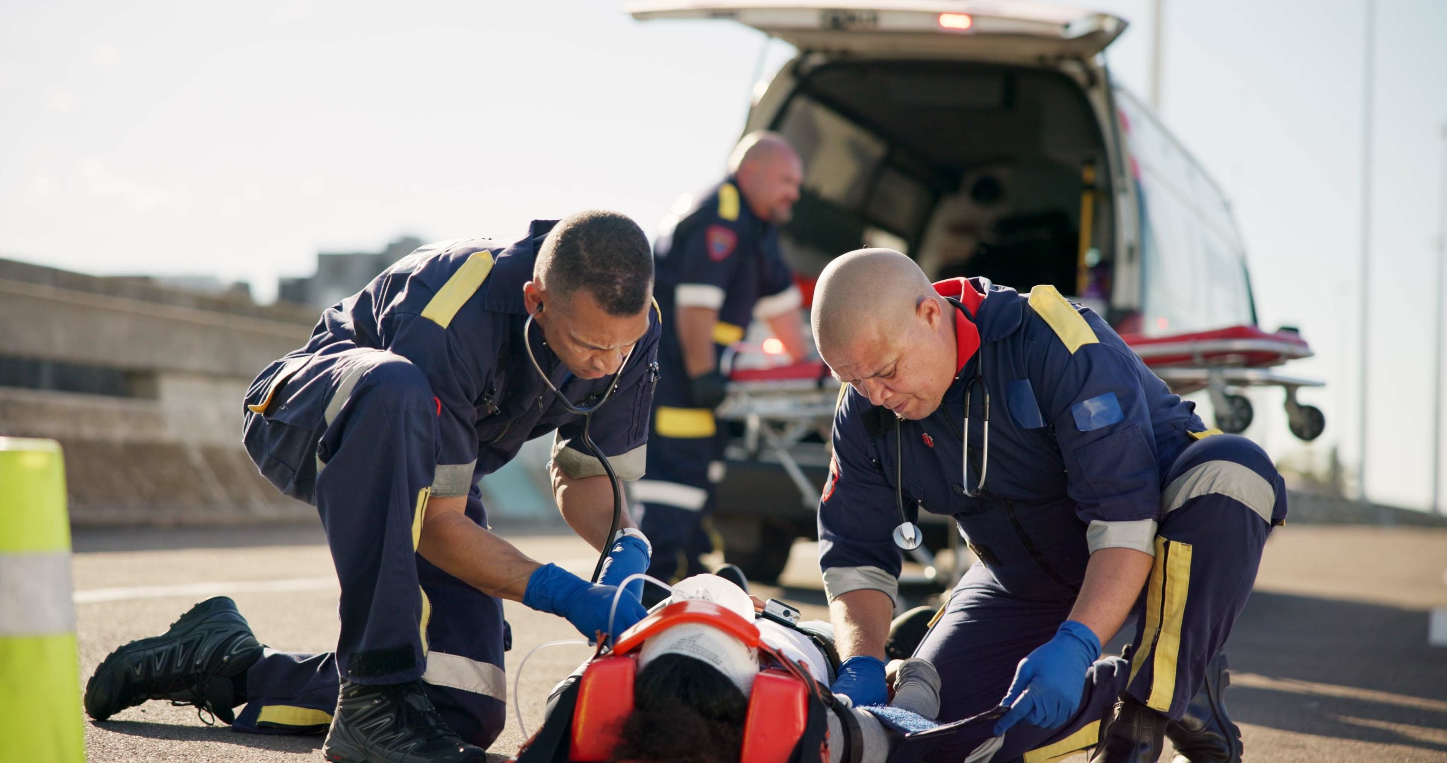 Emergency medical services responding to a hit-and-run incident in the United States, providing urgent care to the injured