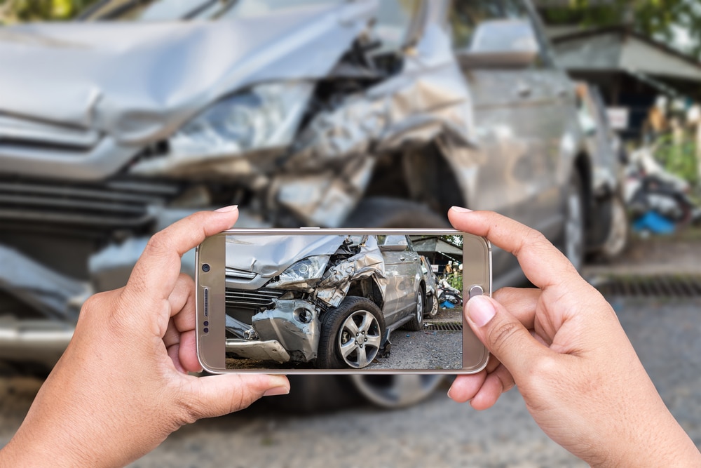 Taking a photo of the electric car accident