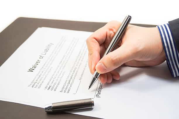 Gym membership waiver form with signature fields and liability release text
