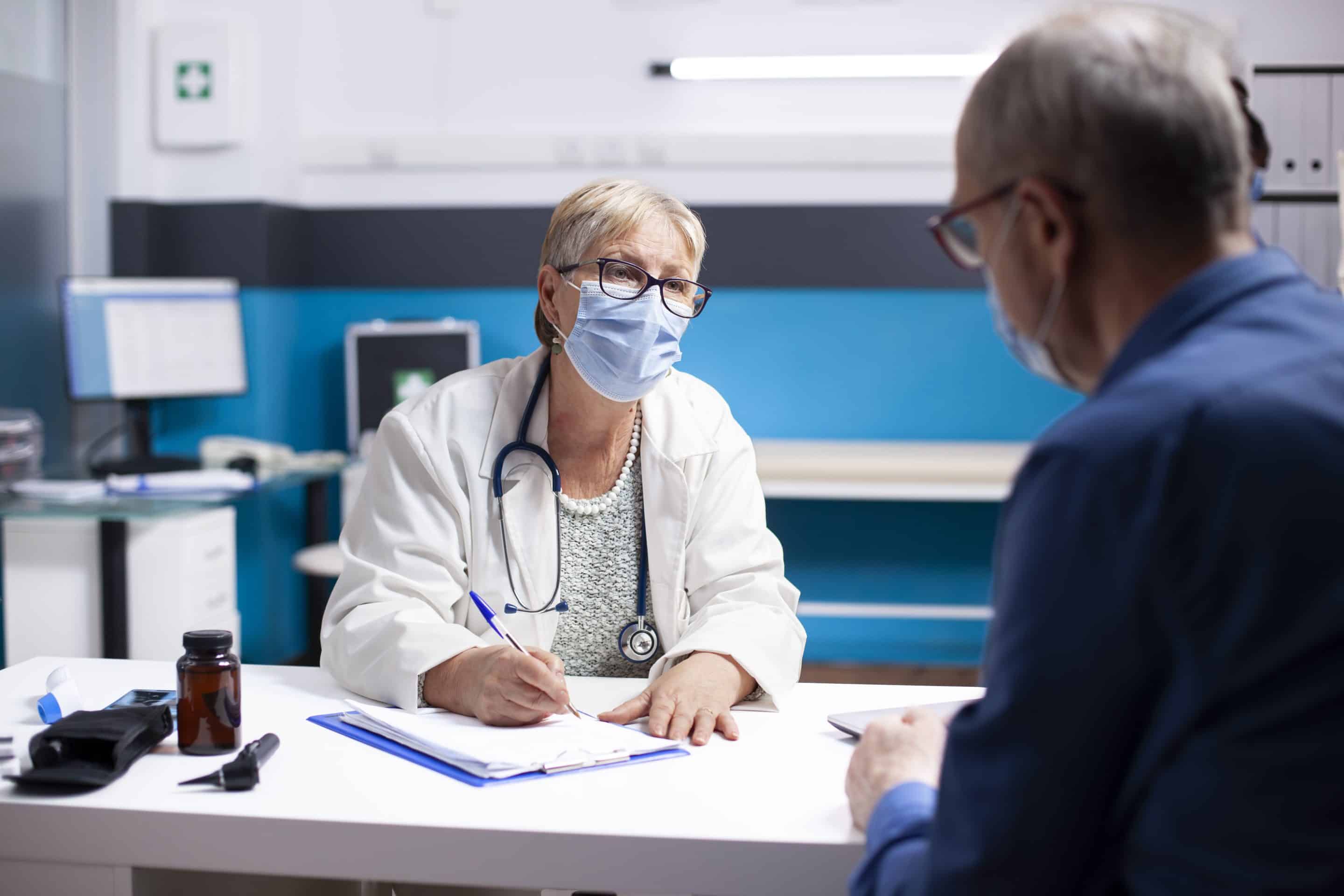 HIPAA Compliance document on a desk next to a stethoscope and a pen for healthcare privacy