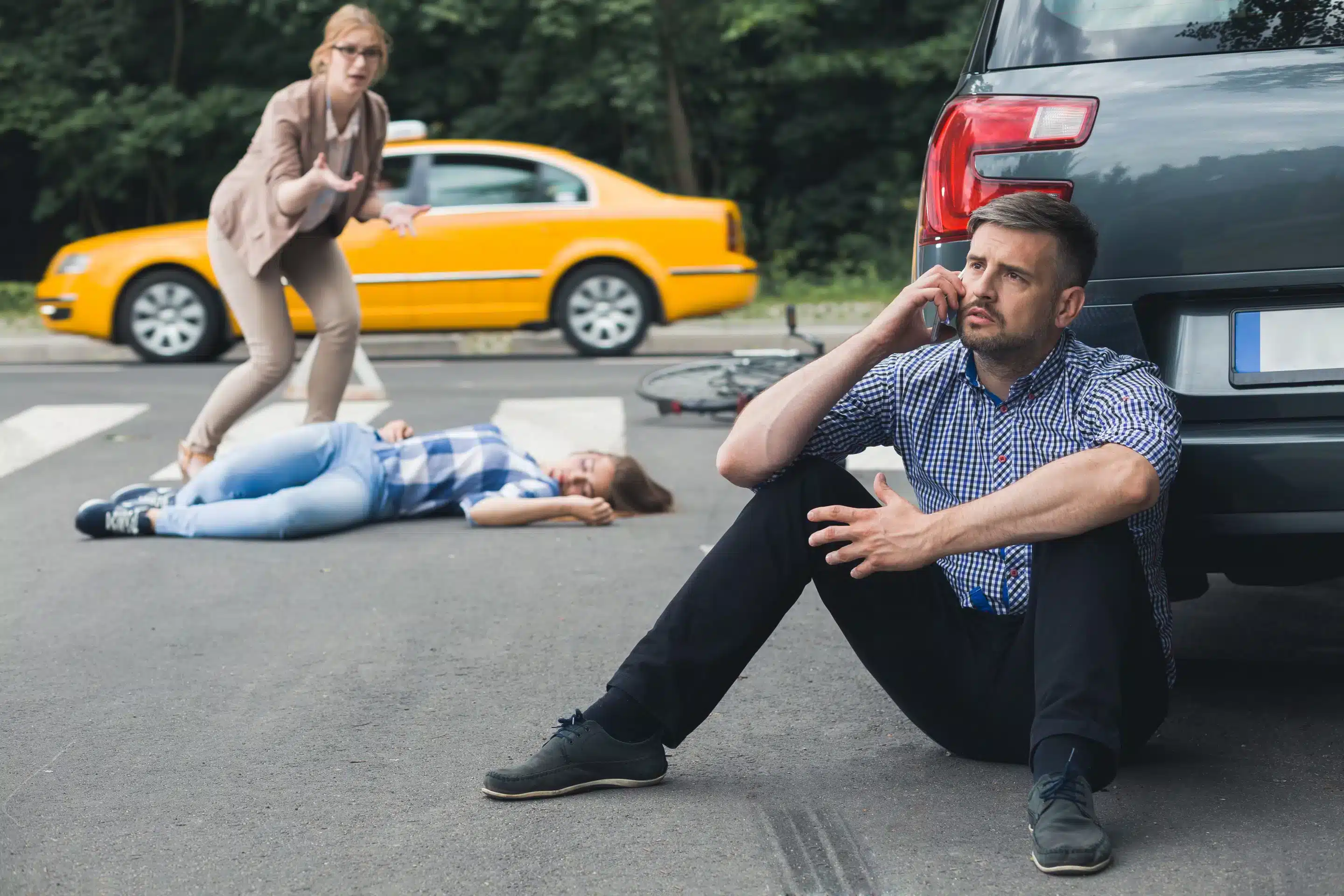 Scene of a pedestrian and bicycle accident involving a motor vehicle, representing personal injury litigation, car accident liability, and legal advocacy for injured victims